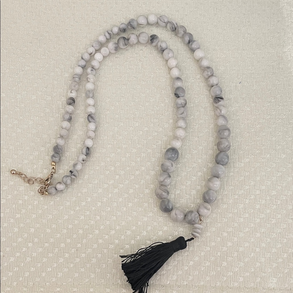 Elegant White and Gray Beaded Necklace with Black Tassel